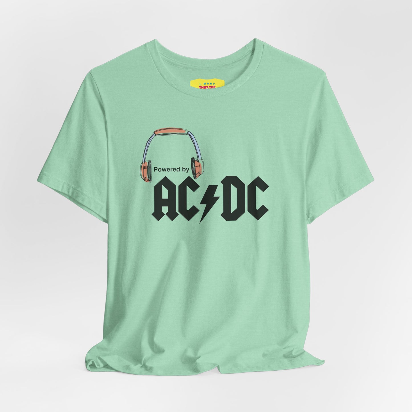 POWERED BY AC/DC (Black text, Unisex Softstyle T-Shirt)