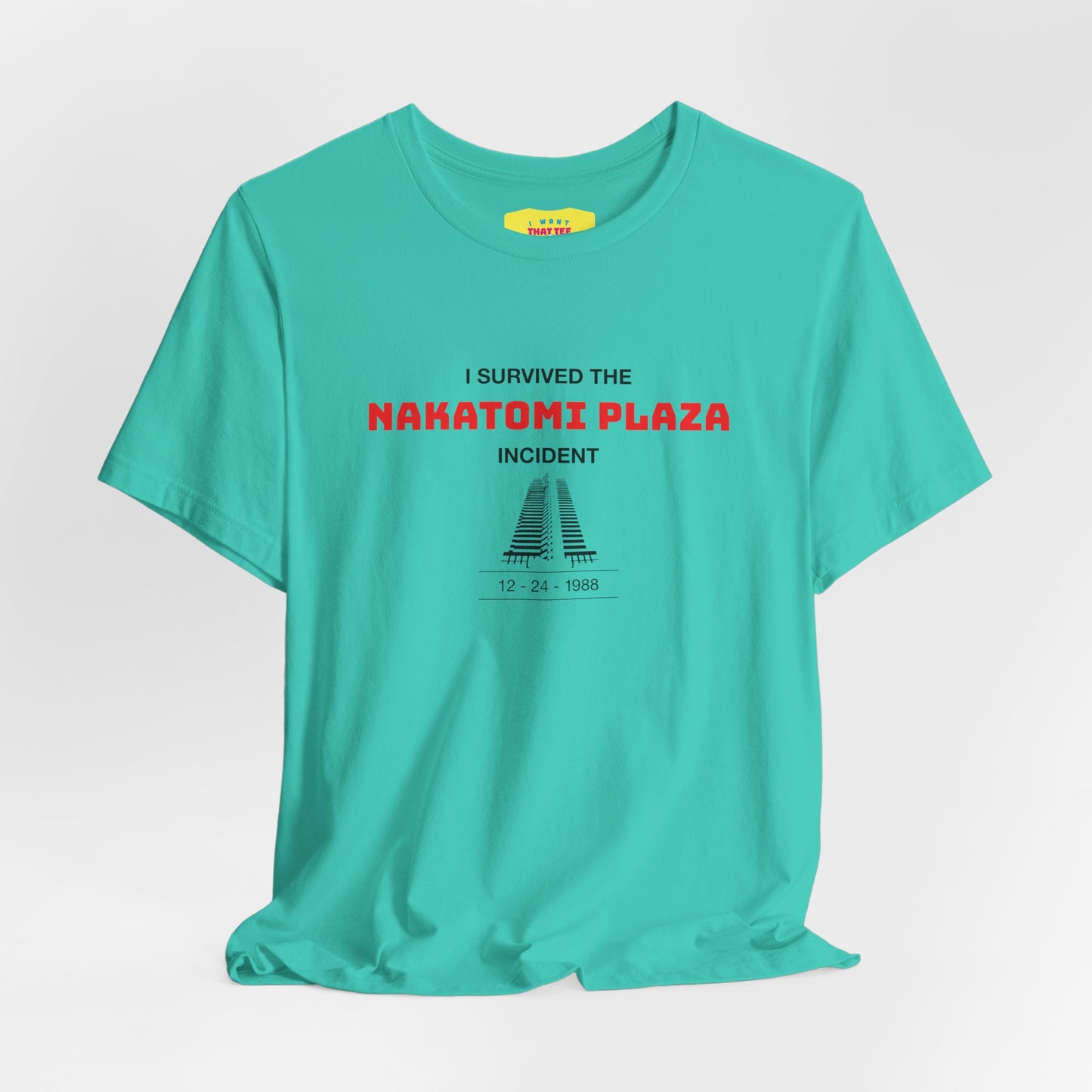 I SURVIVED THE NAKATOMI PLAZA INCIDENT - DIE HARD JOKE (Unisex Softstyle T-Shirt)