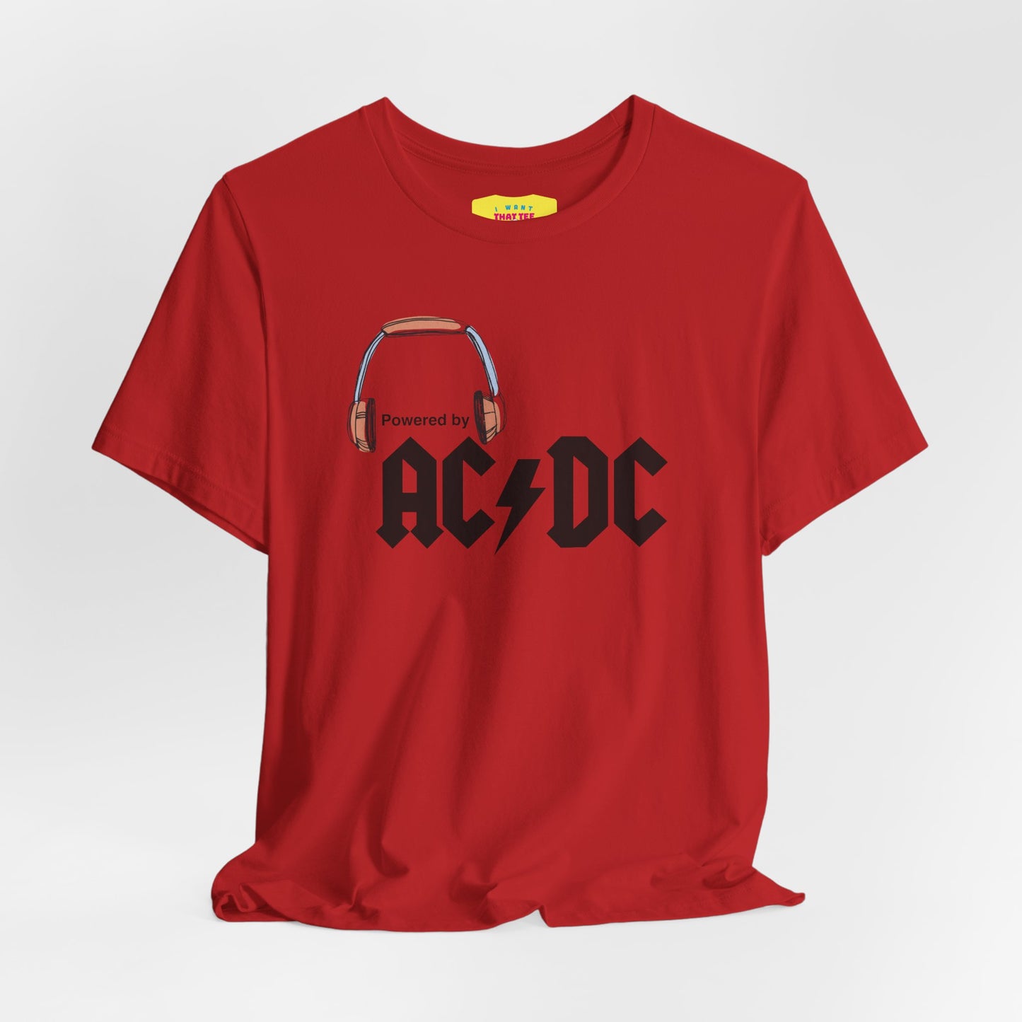 POWERED BY AC/DC (Black text, Unisex Softstyle T-Shirt)